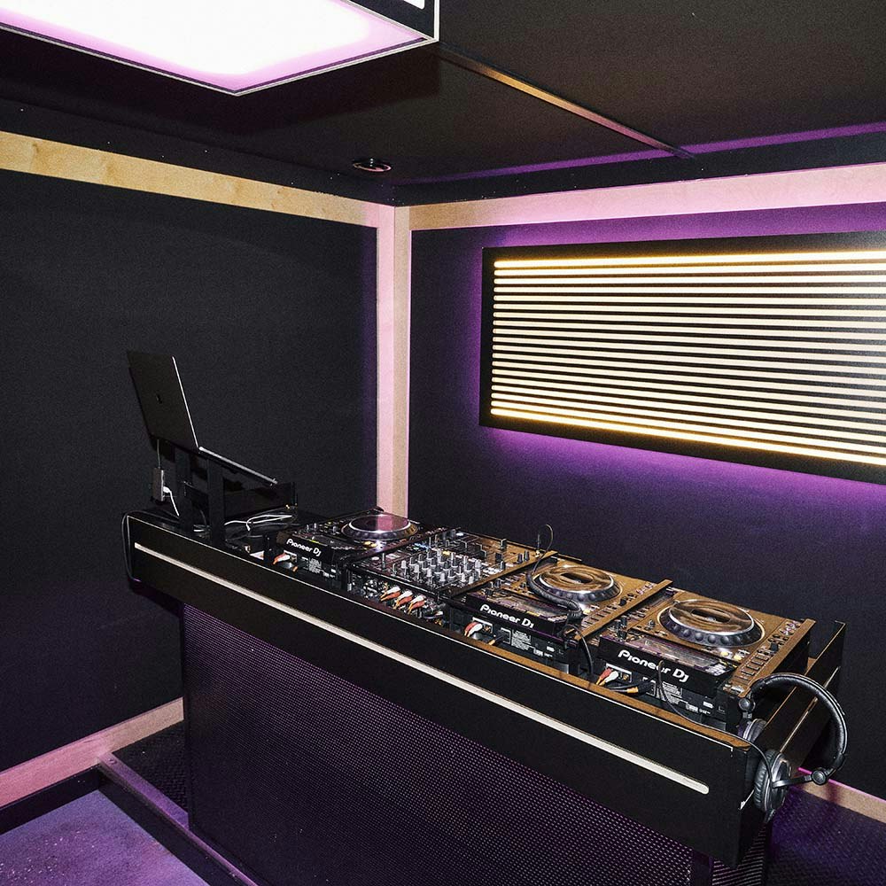 This image may contain: interior design, indoors, lcd screen, electronics, monitor, screen, display, lighting