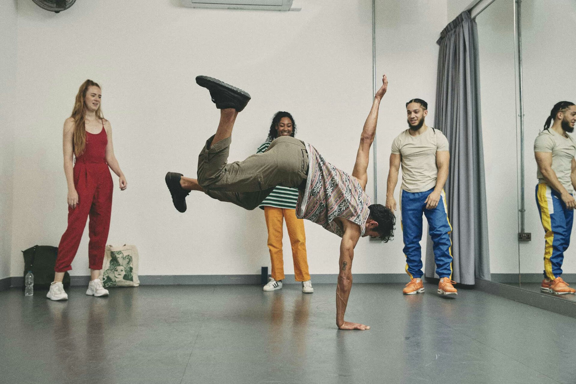 Performers dancing for exercise inside a Pirate dance studio