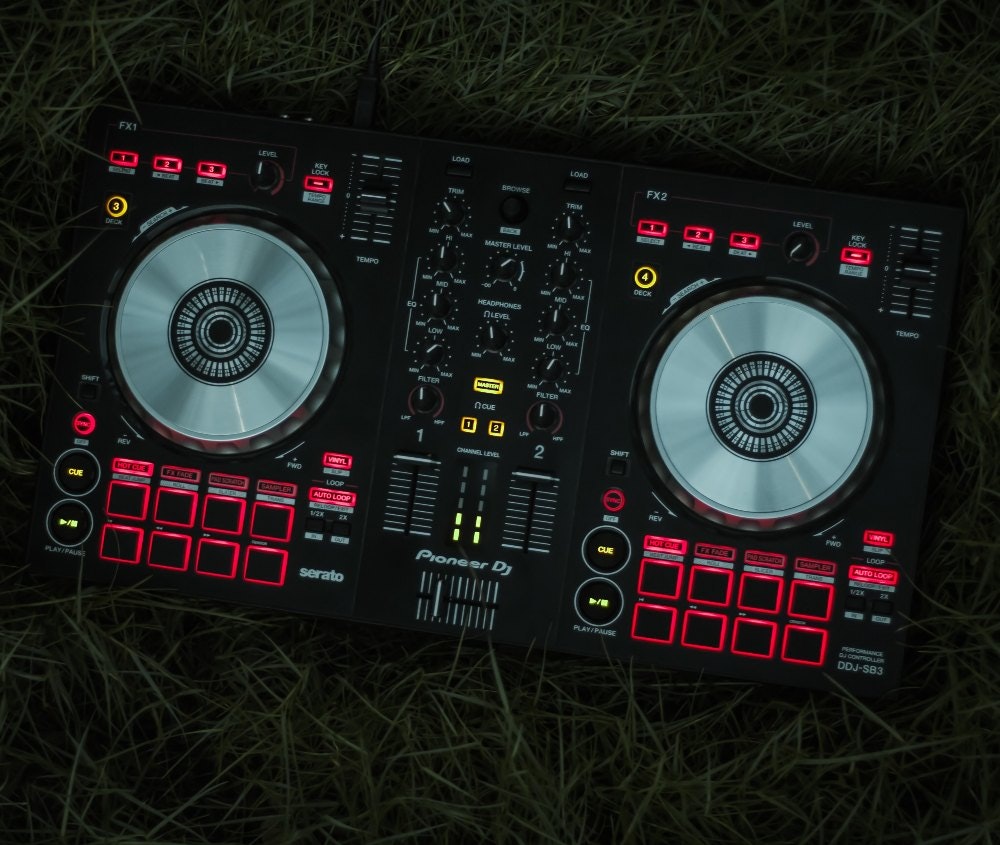 2-deck DJ set up with glowing red buttons