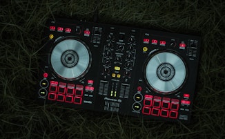 2-deck DJ set up with glowing red buttons