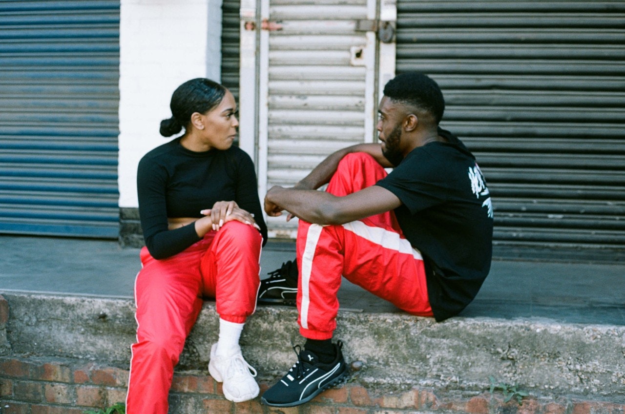 Dancers resting outside a Pirate Studio location