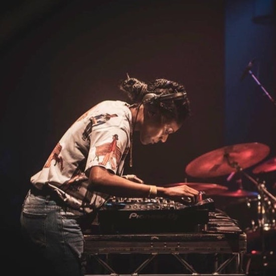 This image may contain: musician, musical instrument, person, human, drummer, percussion
