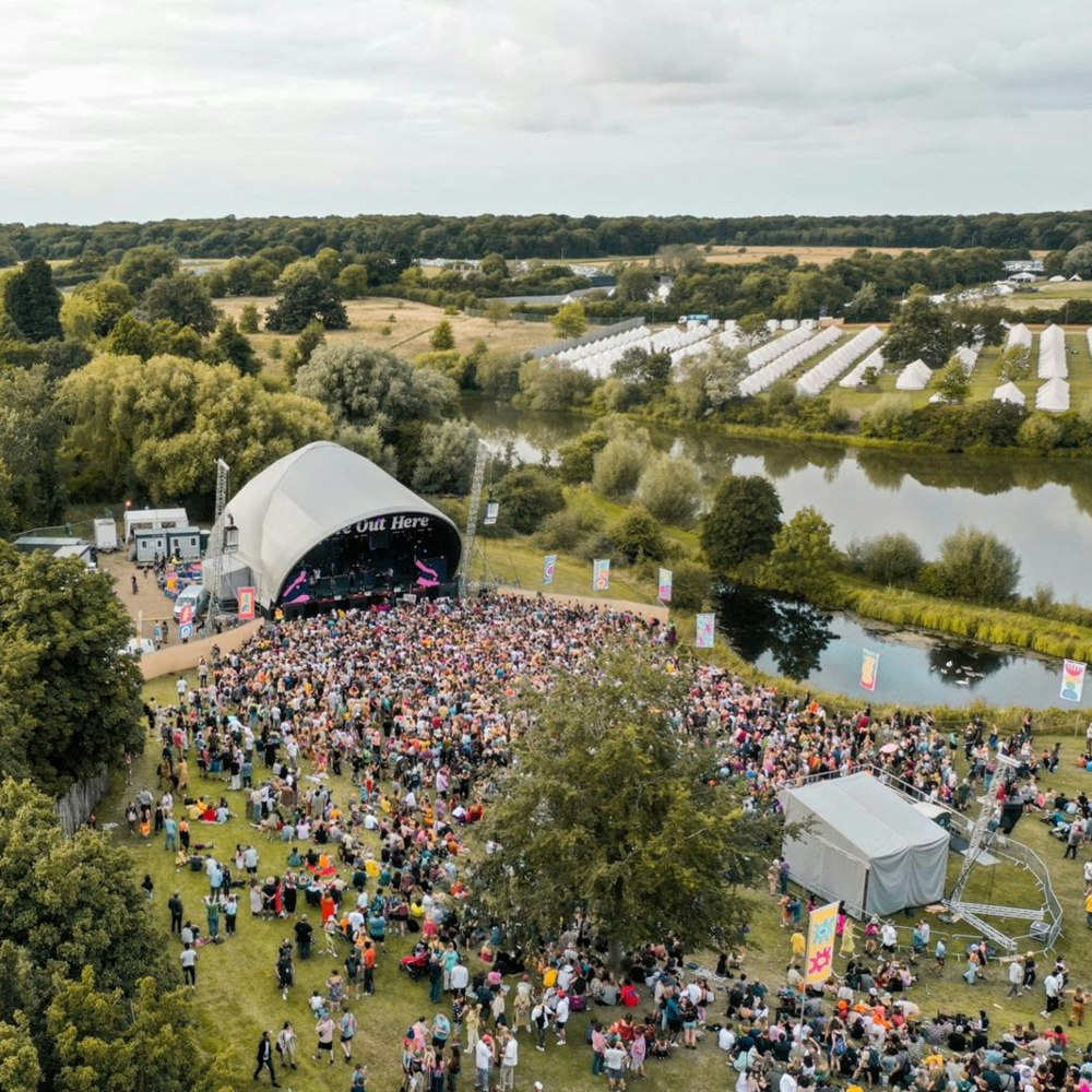 This image may contain: landscape, outdoors, nature, scenery, person, human, crowd, festival, panoramic, aerial view