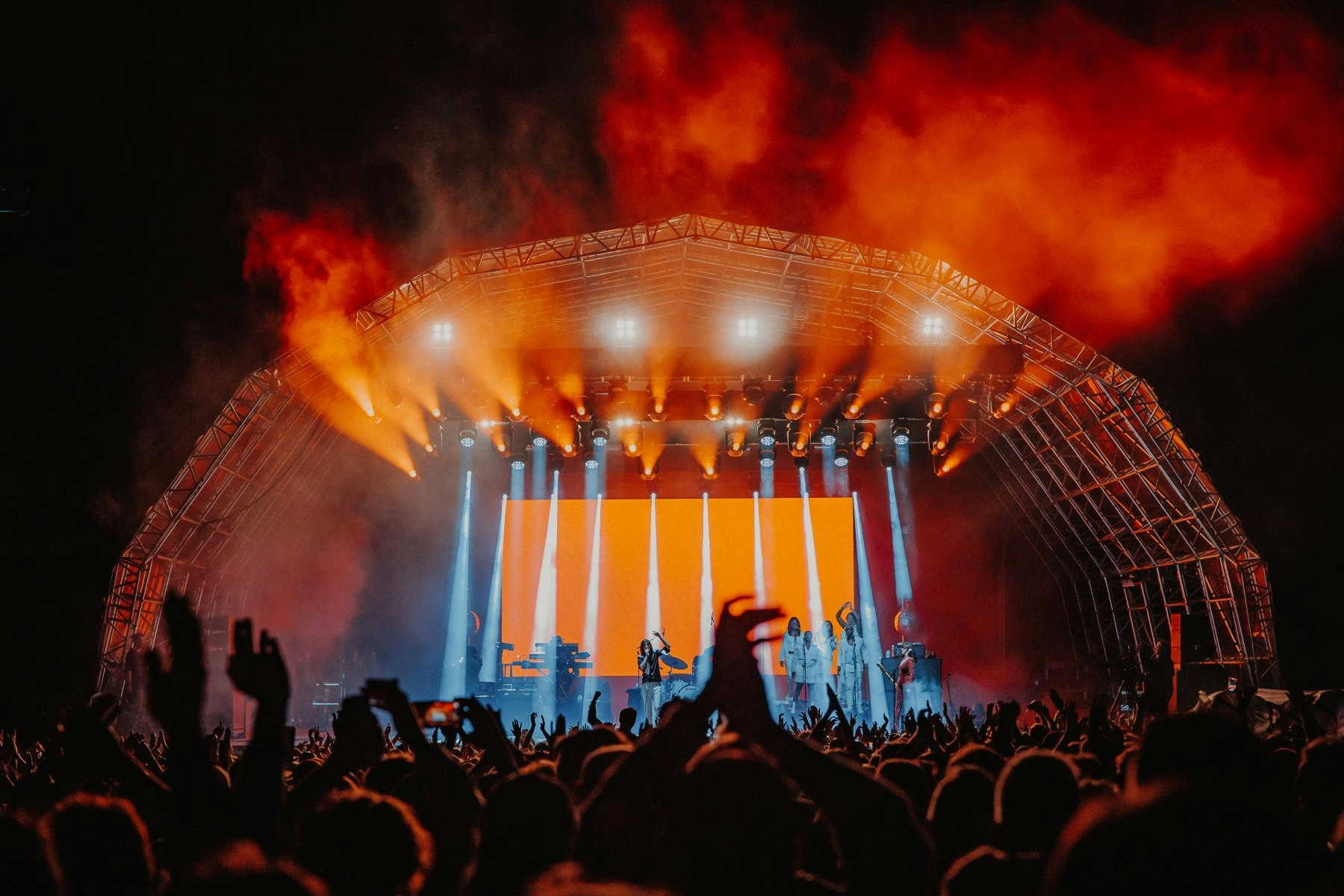 This image may contain: concert, crowd, person, stage, rock concert, urban, lighting