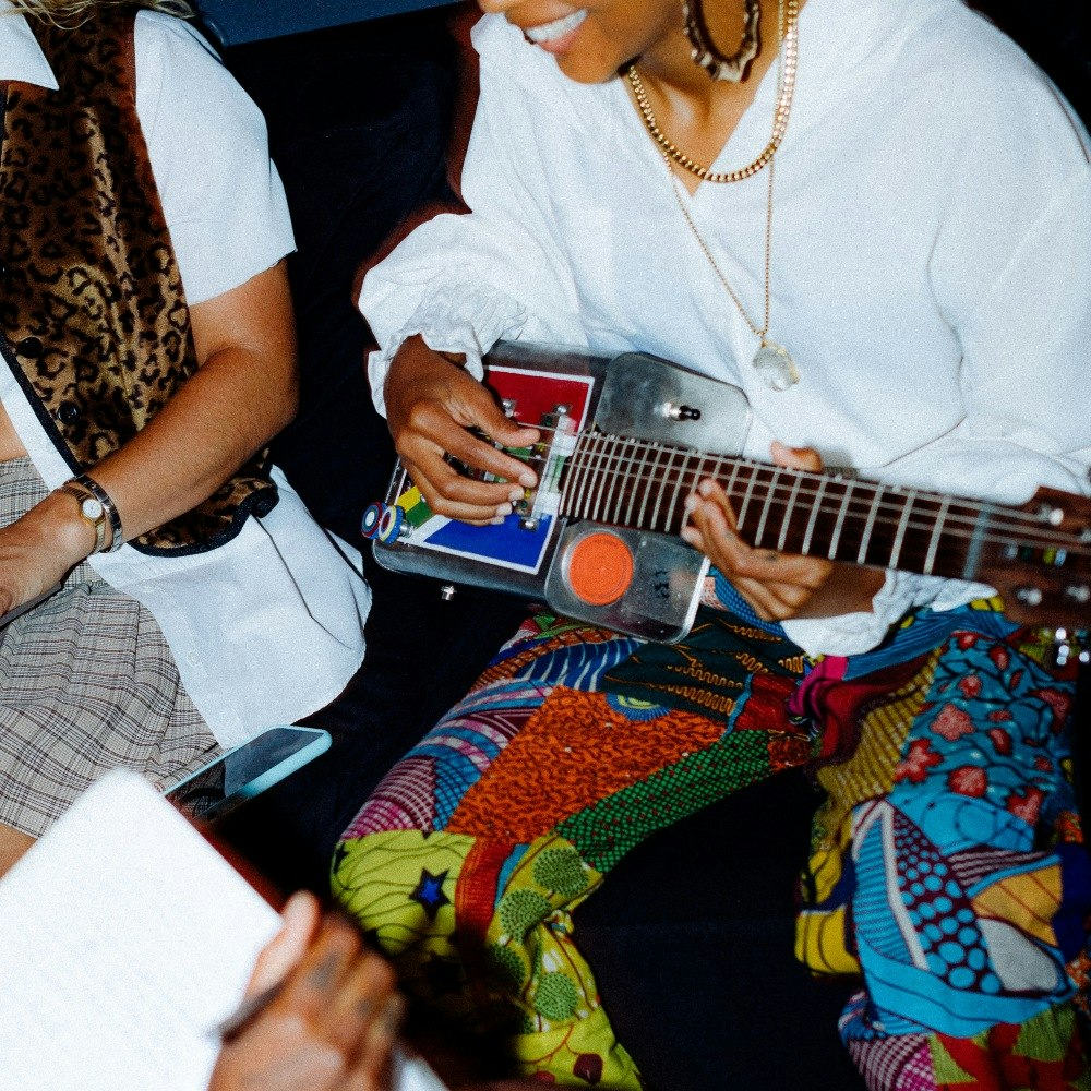 Woman learning to play a new instrument