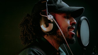 Artist in a recording studio at Pirate Studios