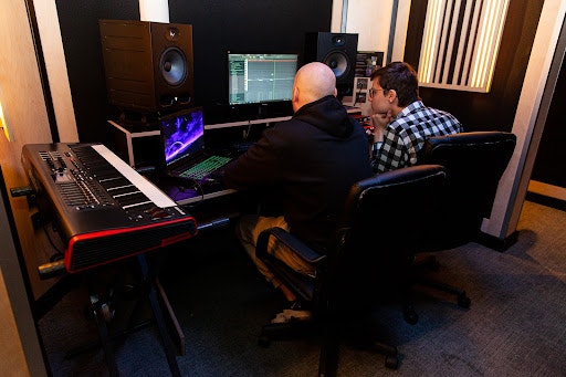 Artists workshoping music production