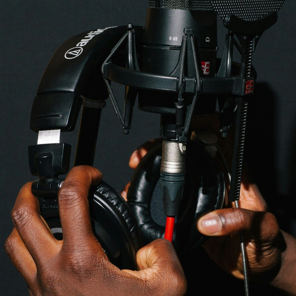 Artist showing professional headphones