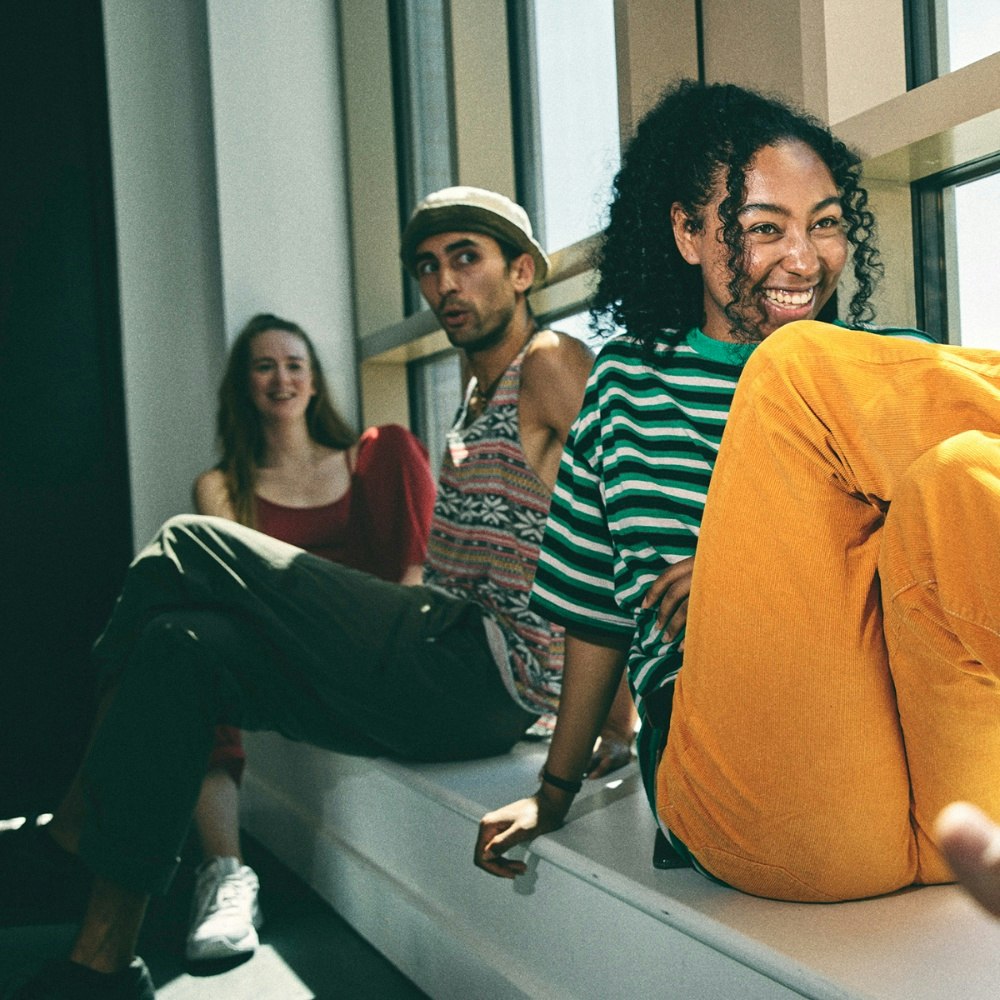 Students sitting by the window during a class