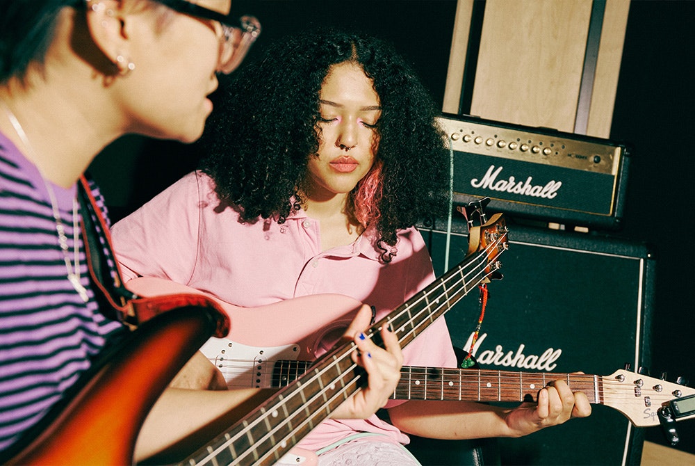 Artists playing guitar and singing @ Pirate Studios