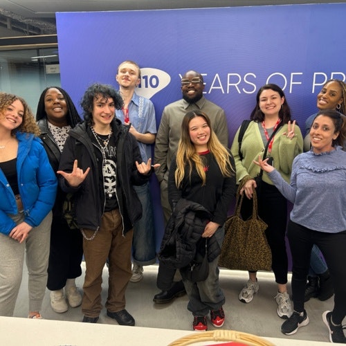 This image may contain: groupshot, person, people, handbag, pants, shoe, adult, female, woman, man