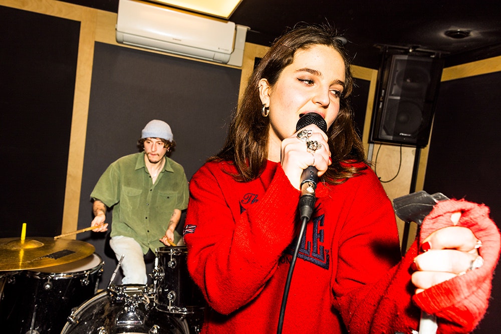 Artists playing guitar and singing @ Pirate Studios