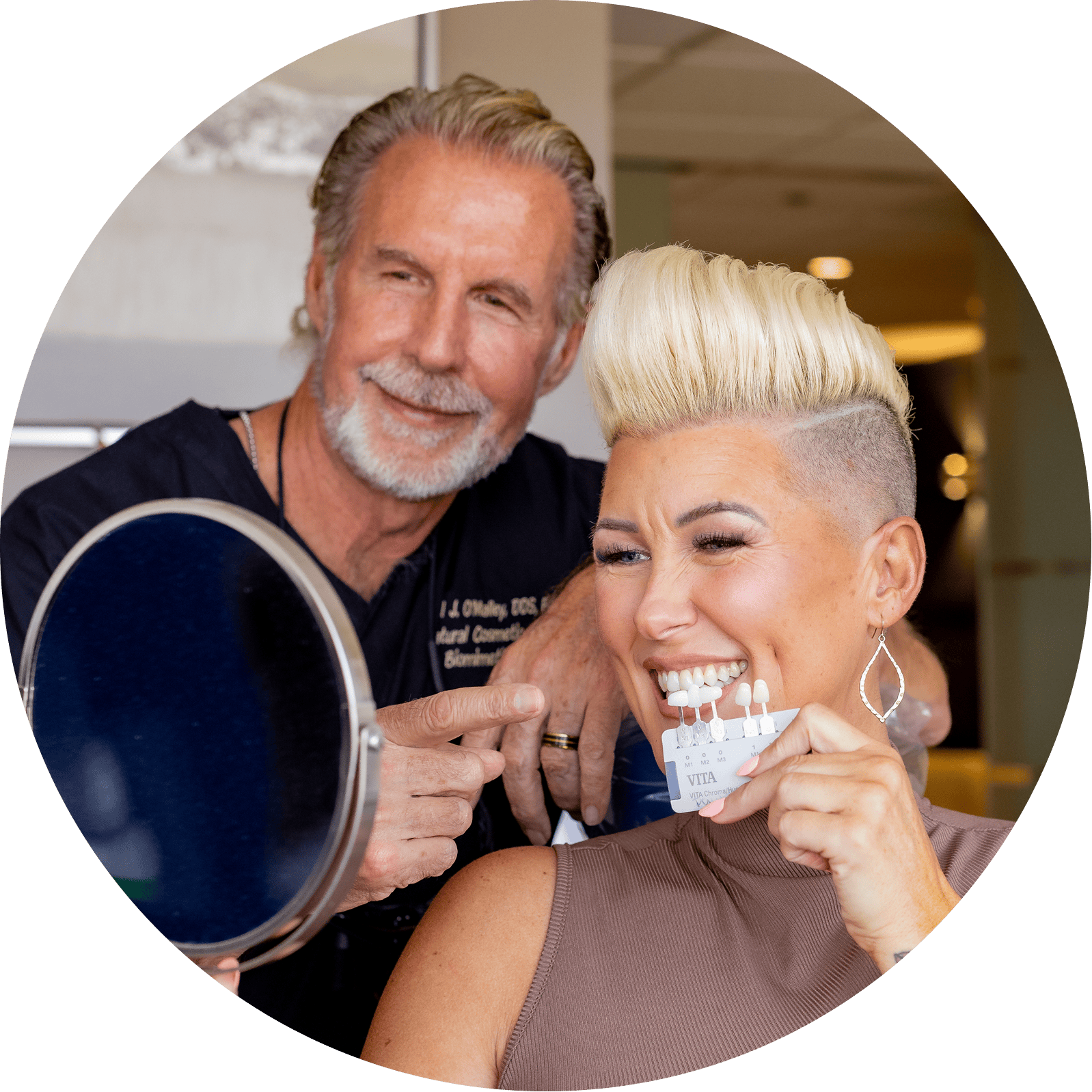 Dr. Paul O'malley working with a patient