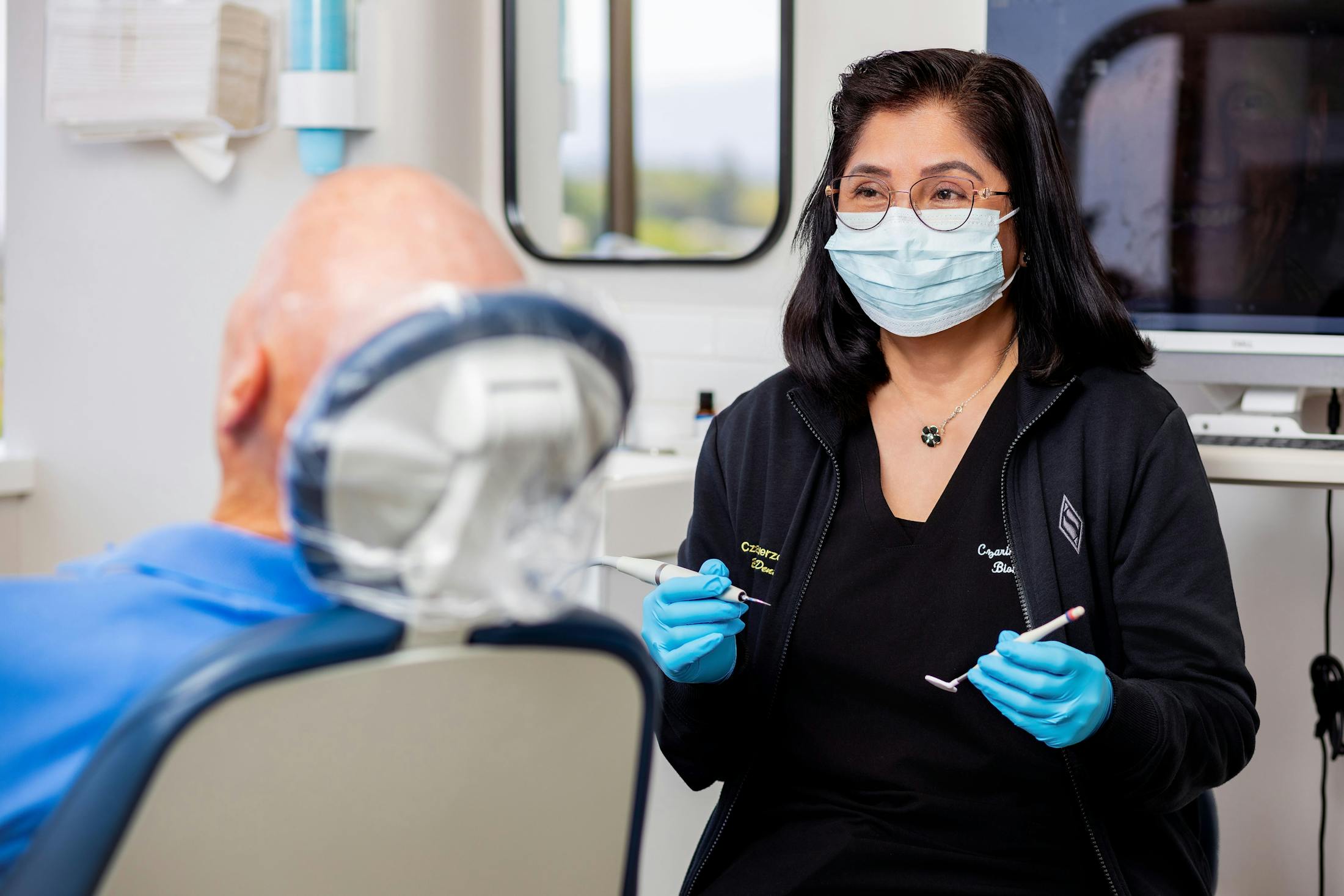 staff member speaking with patient