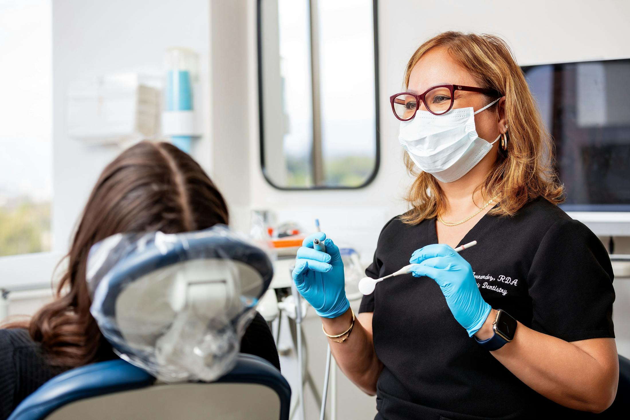 nurse working on patient