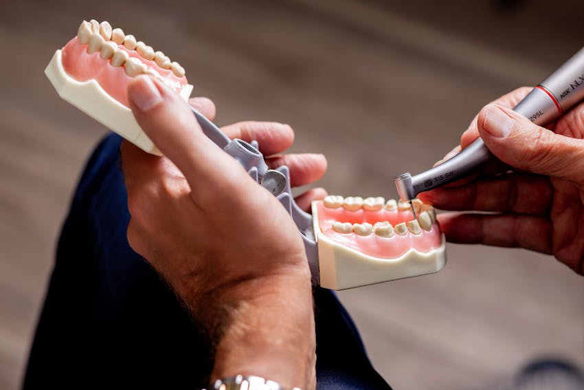 set of teeth getting smoothed