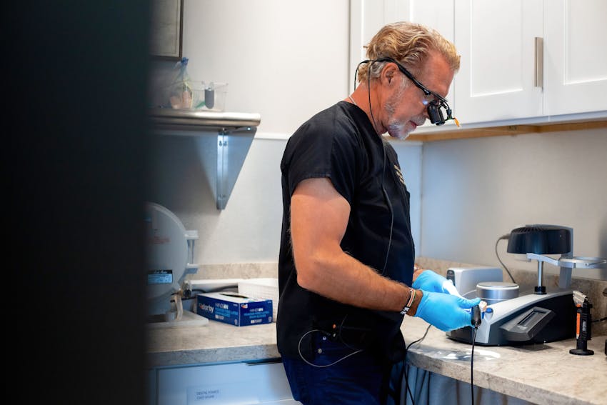 Dr. Paul O'Malley working on implant