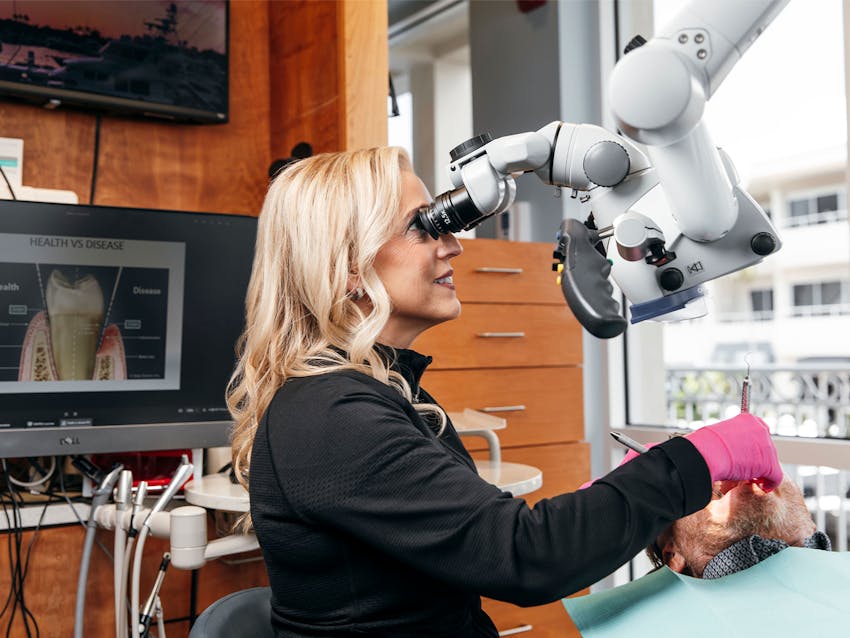 staff member working on patient's mouth