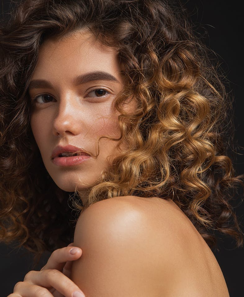 Woman looking over her shoulder