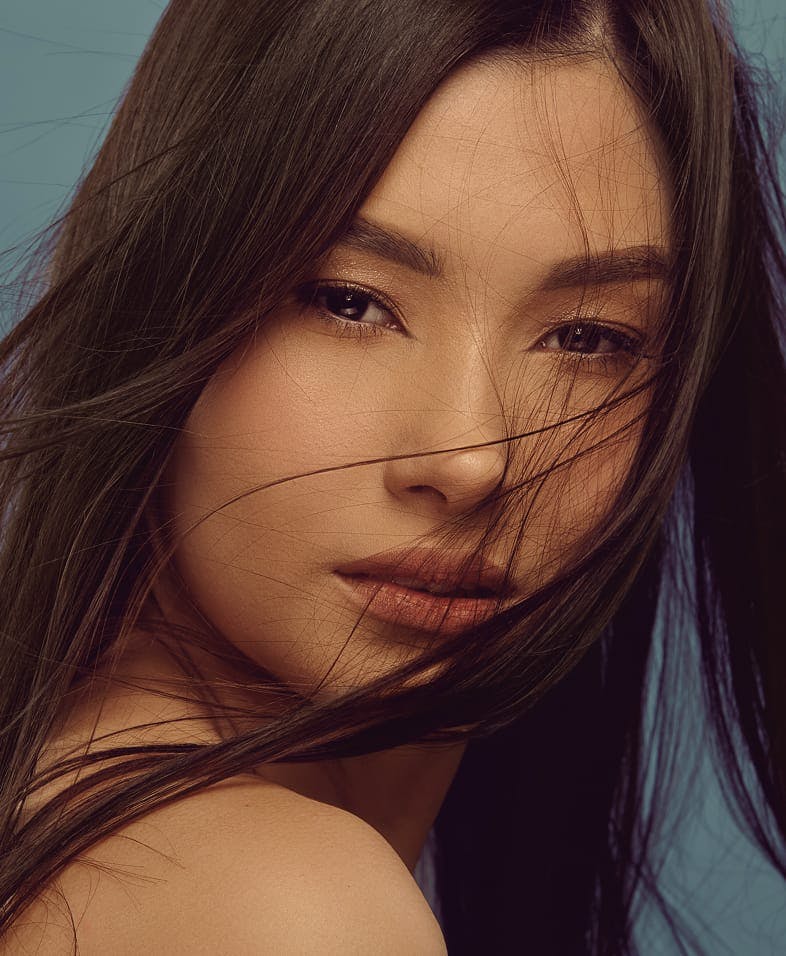 Woman with hair in her face