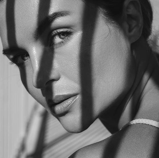 woman with shadows on her face