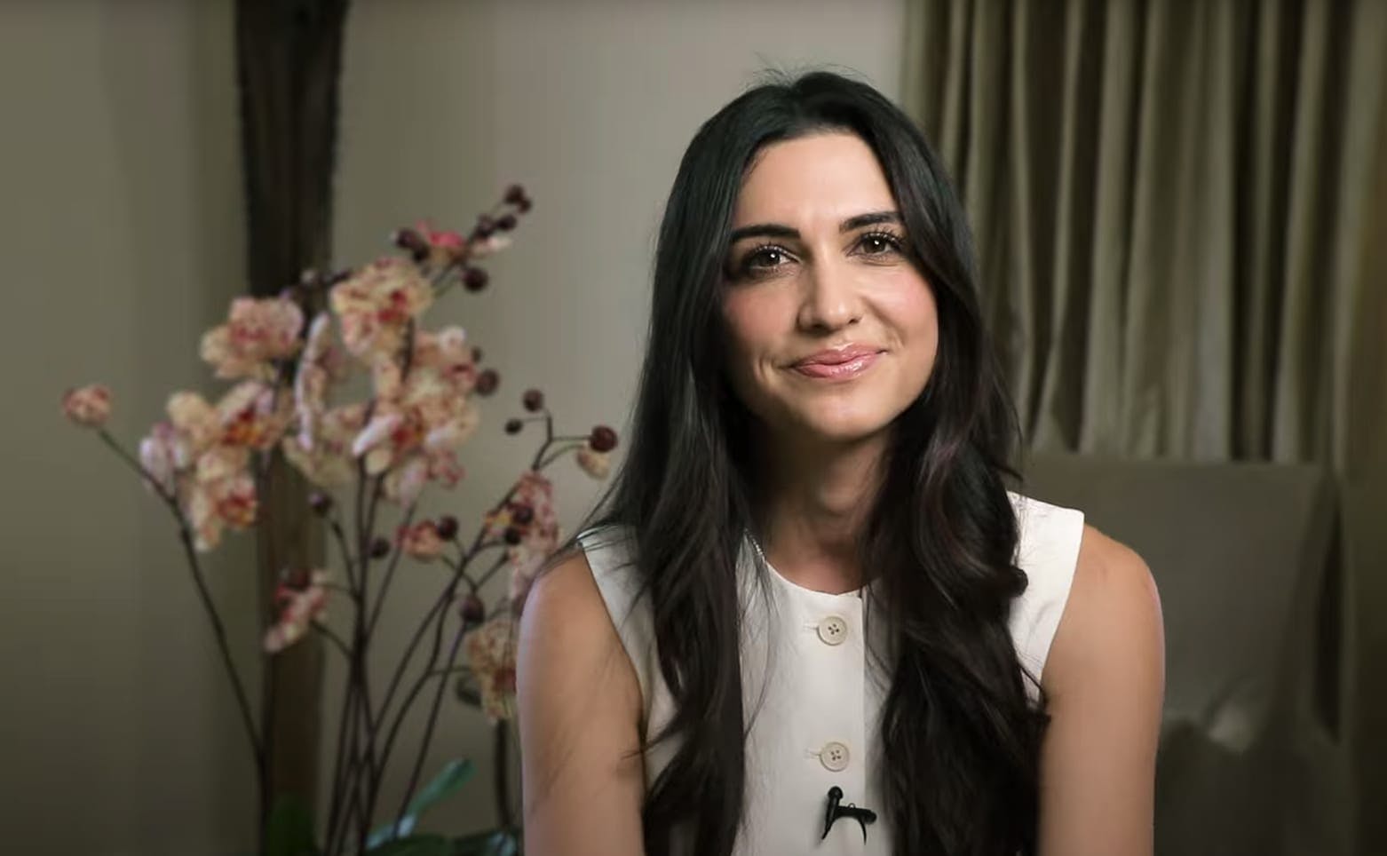 Dr. Dahna Abbassi seated in interview setting