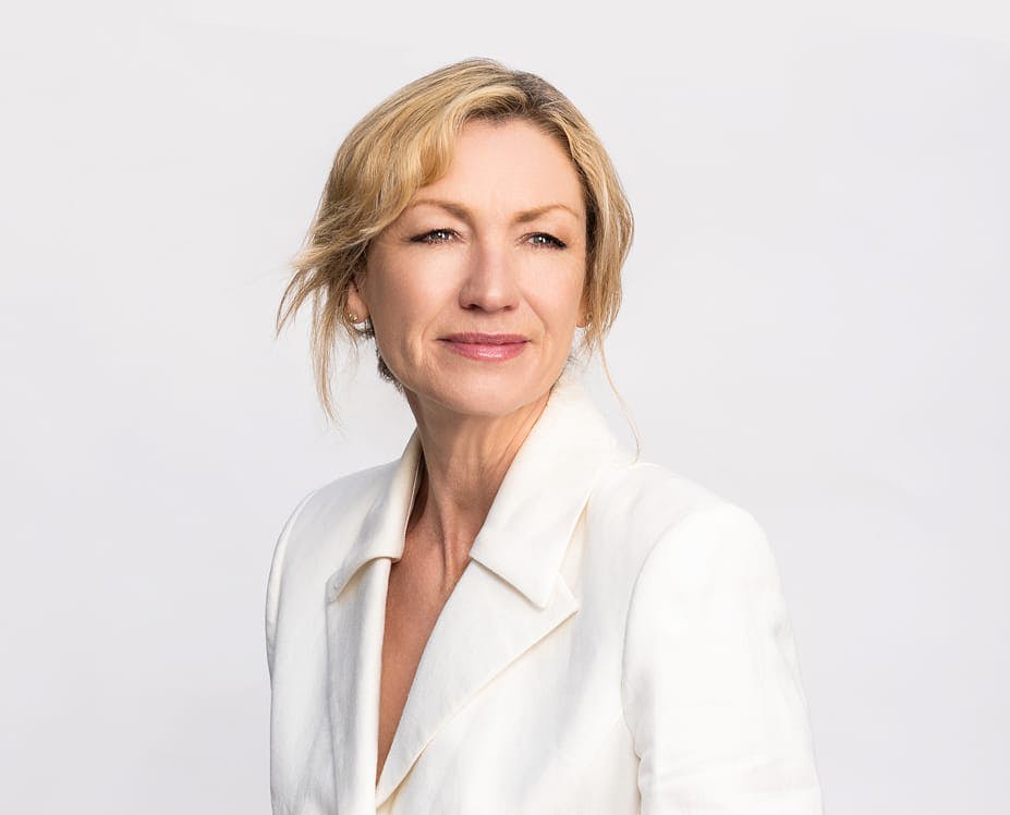 woman in a white coat