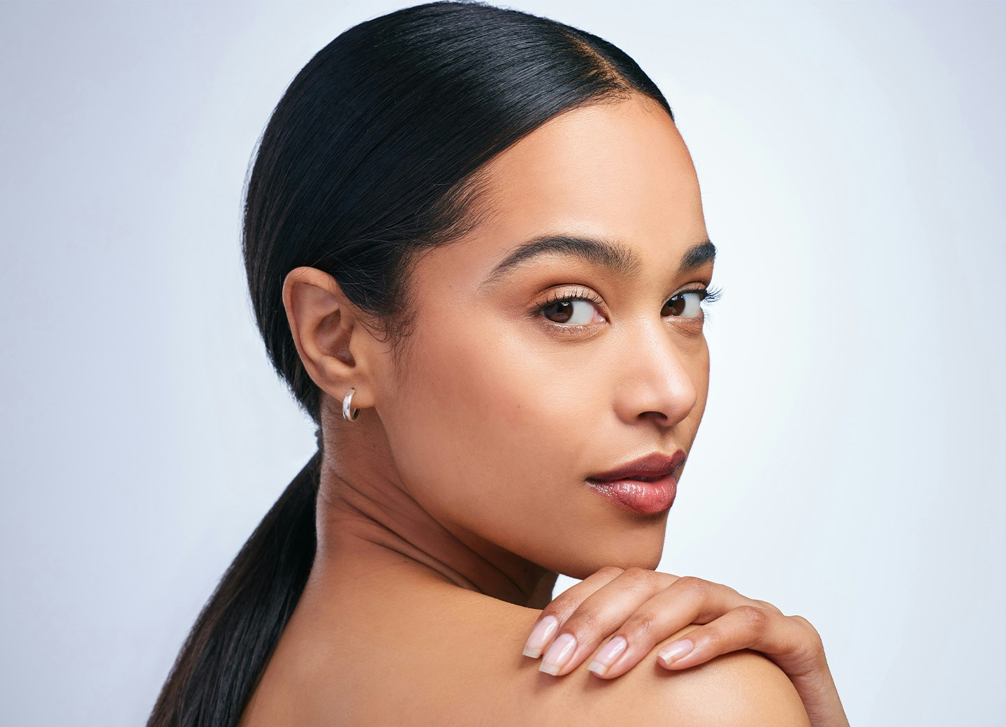 Woman looking over shoulder