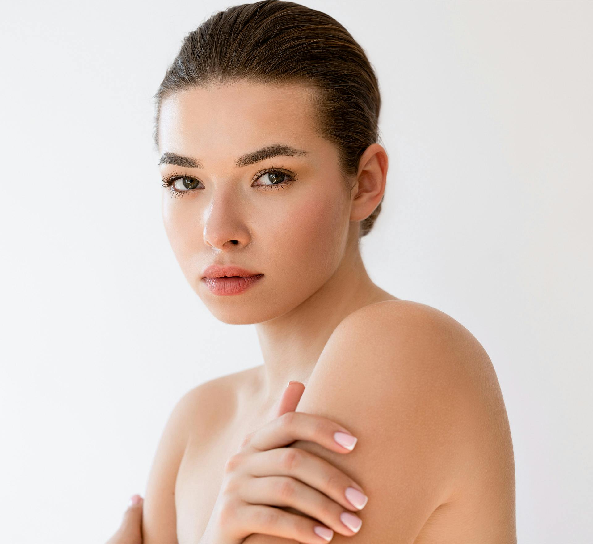 Woman with short hair crossing arms