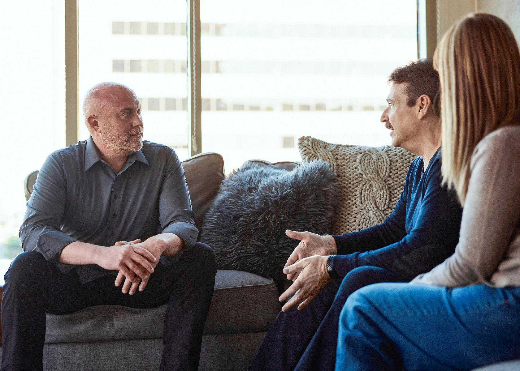 client and lawyer on couch