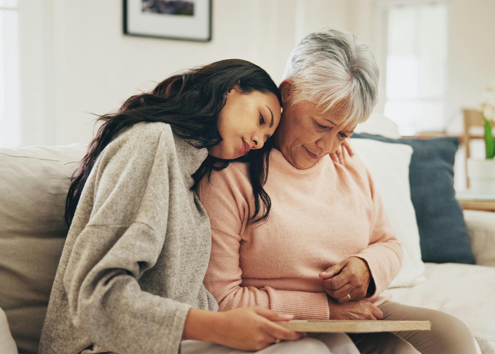person hugging grandma