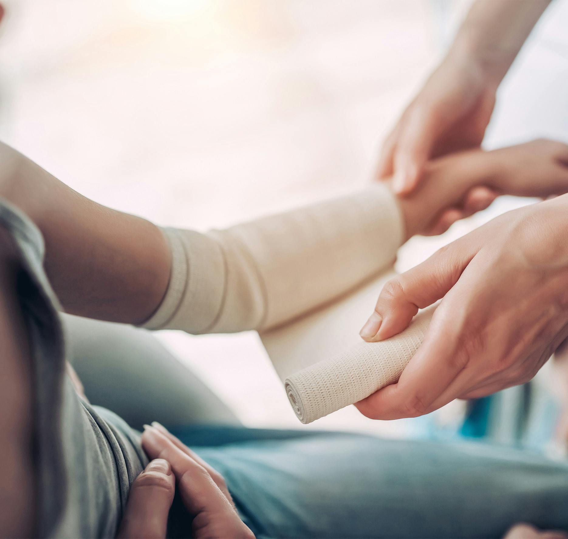 child getting arm wrapped