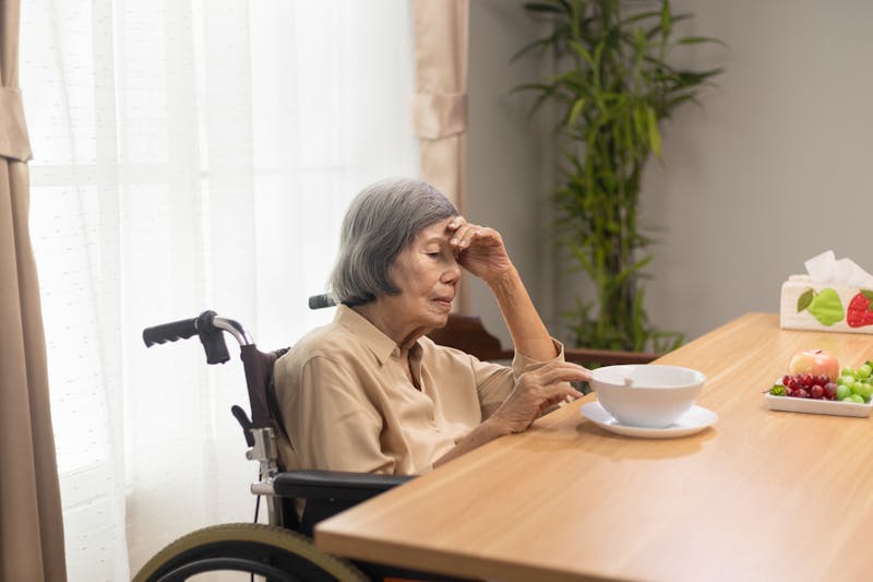 A woman sitting at table
