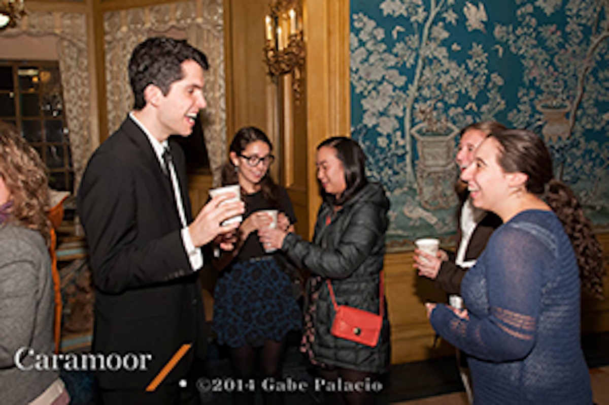 Violinist Ryan Meehan speaks with students and parents after the Calidore String Quartet's November 16 performance at Caramoor