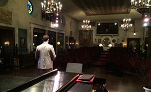 Mason warms up in the vacant Music Room; photo by Chen.