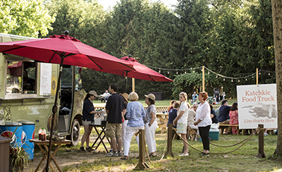 Visitors enjoy the picnic grounds at Caramoor in Katonah New York on July 2, 2016 for the Pops, Patriots, & Fireworks, An Independence Day Celebration. (photo by Gabe Palacio)