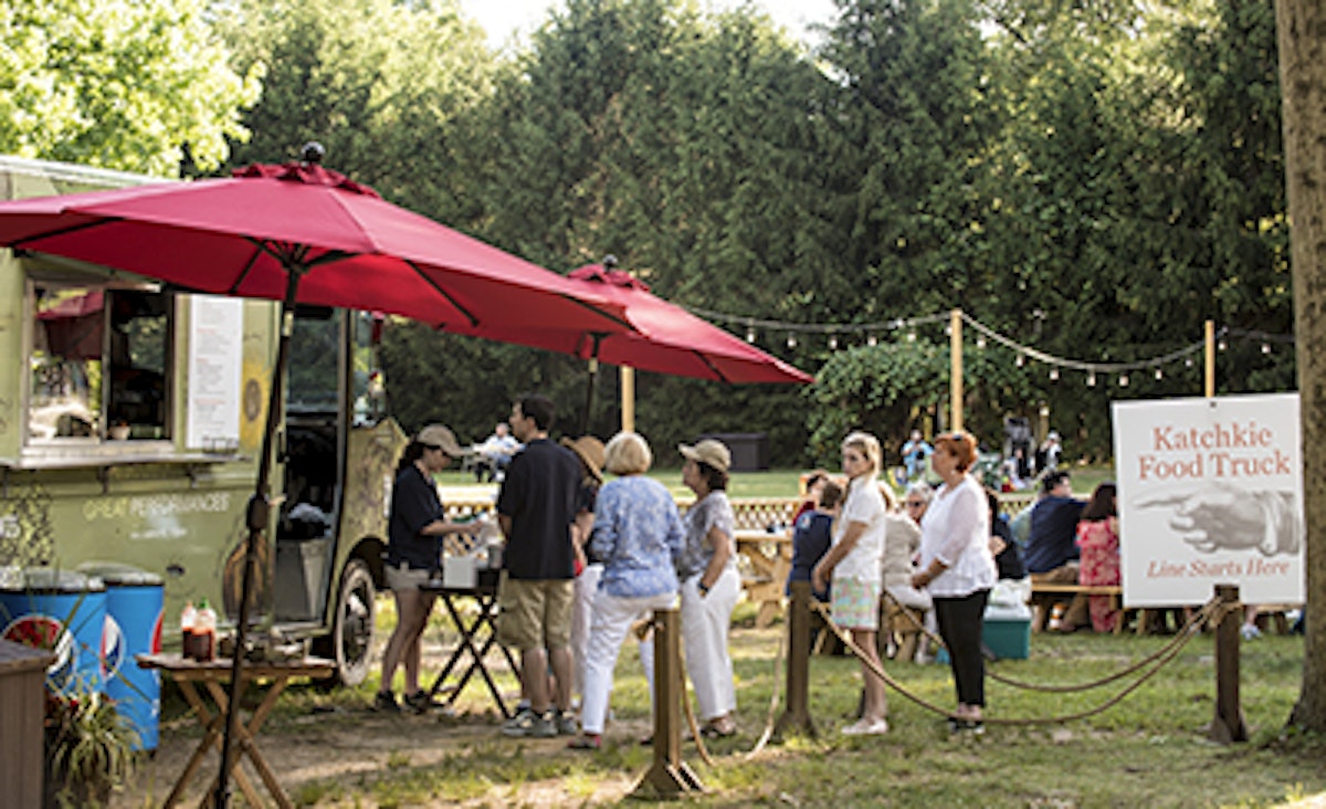 Visitors enjoy the picnic grounds at Caramoor in Katonah New York on July 2, 2016 for the Pops, Patriots, & Fireworks, An Independence Day Celebration. (photo by Gabe Palacio)