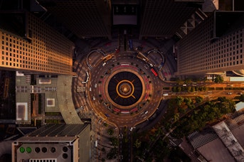 A top down view of a busy motorway in the evening
