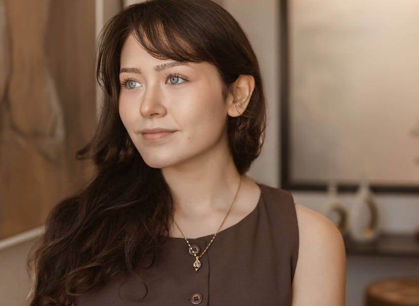 brunette woman with bangs