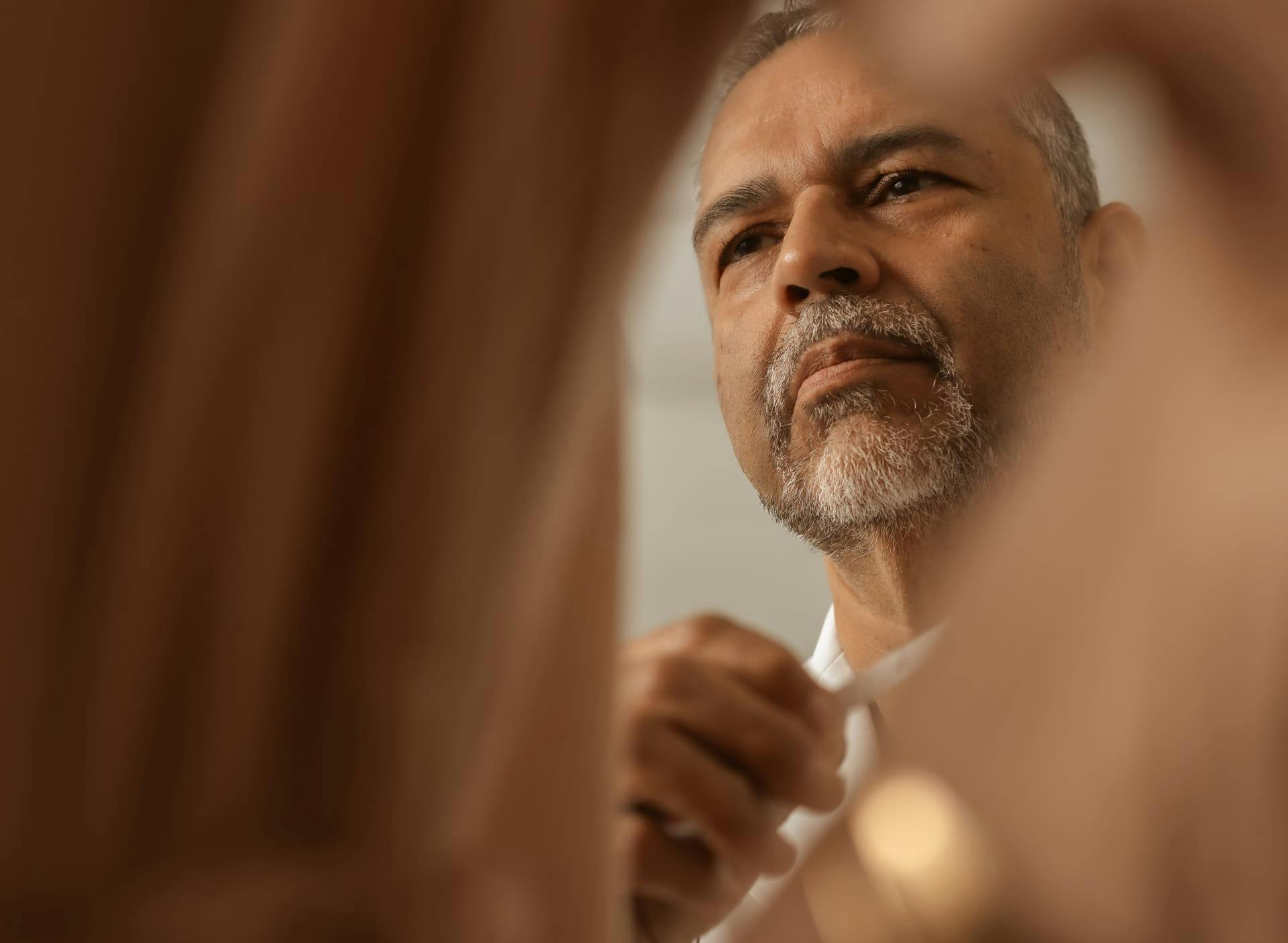 Dr. Munish Batra examining his patient