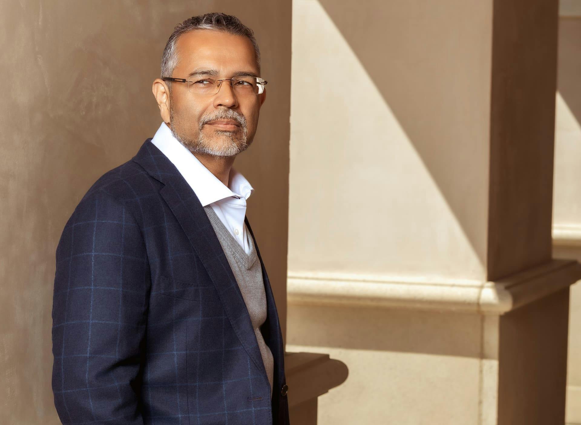 Dr. Munish Batra in blue suit