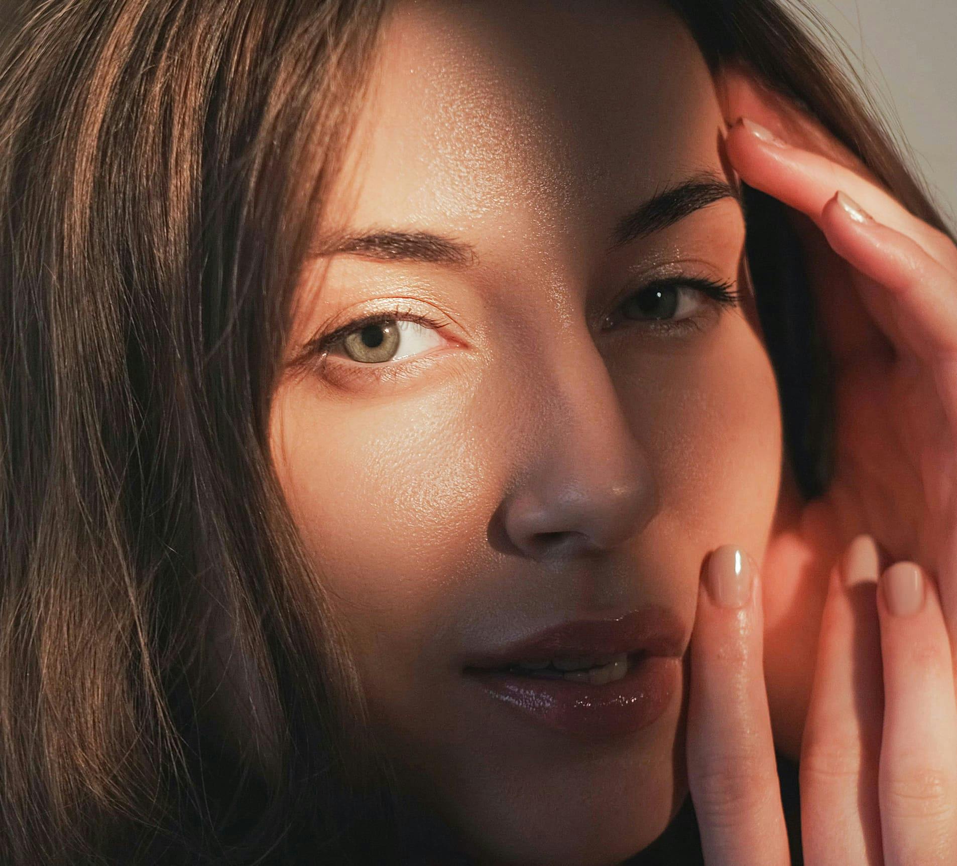 close up on woman with sunlight hitting her eye