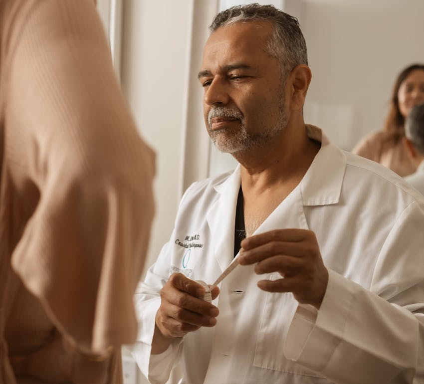Dr. Munish Batra with female patient
