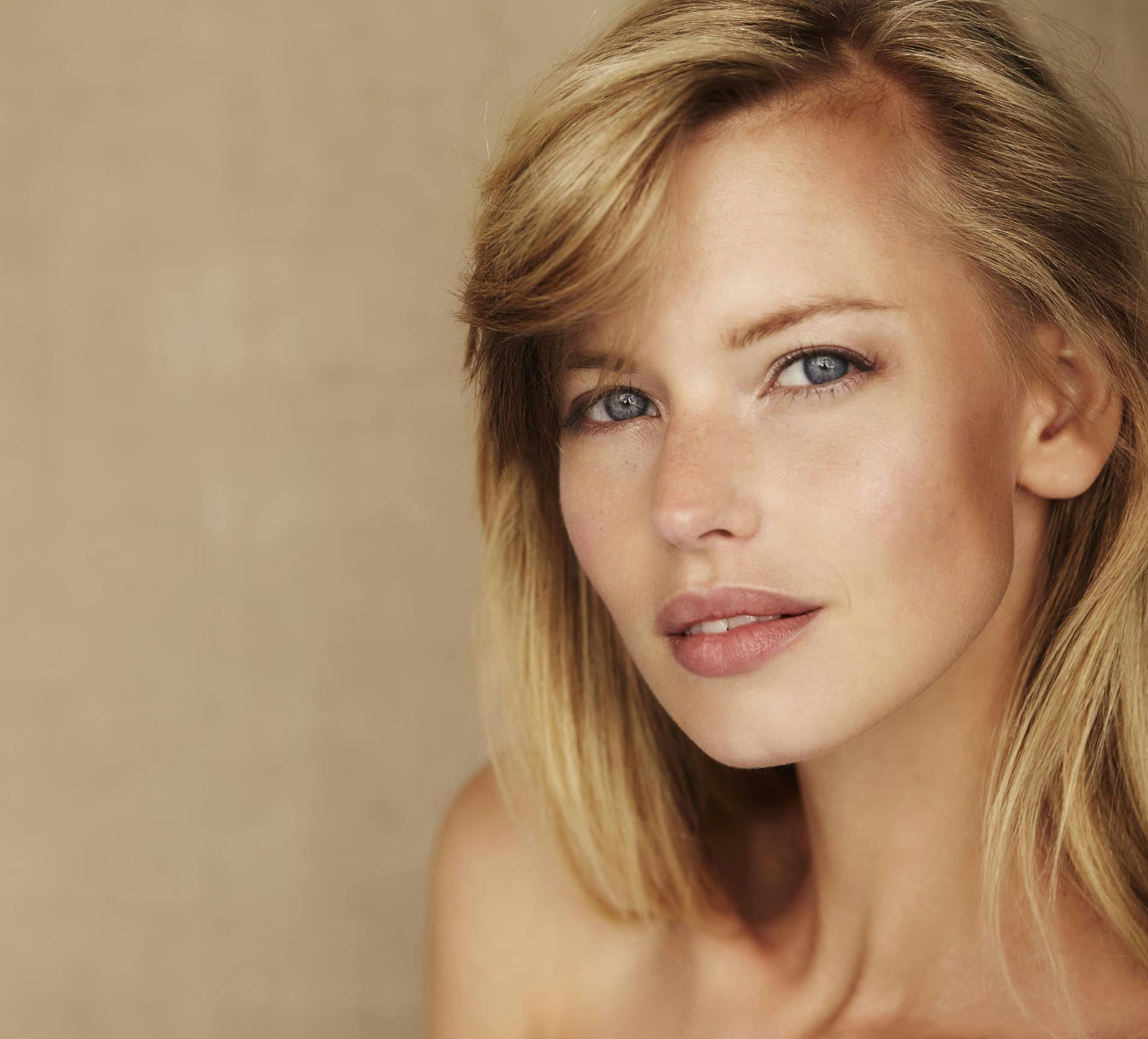 blonde woman looking forward