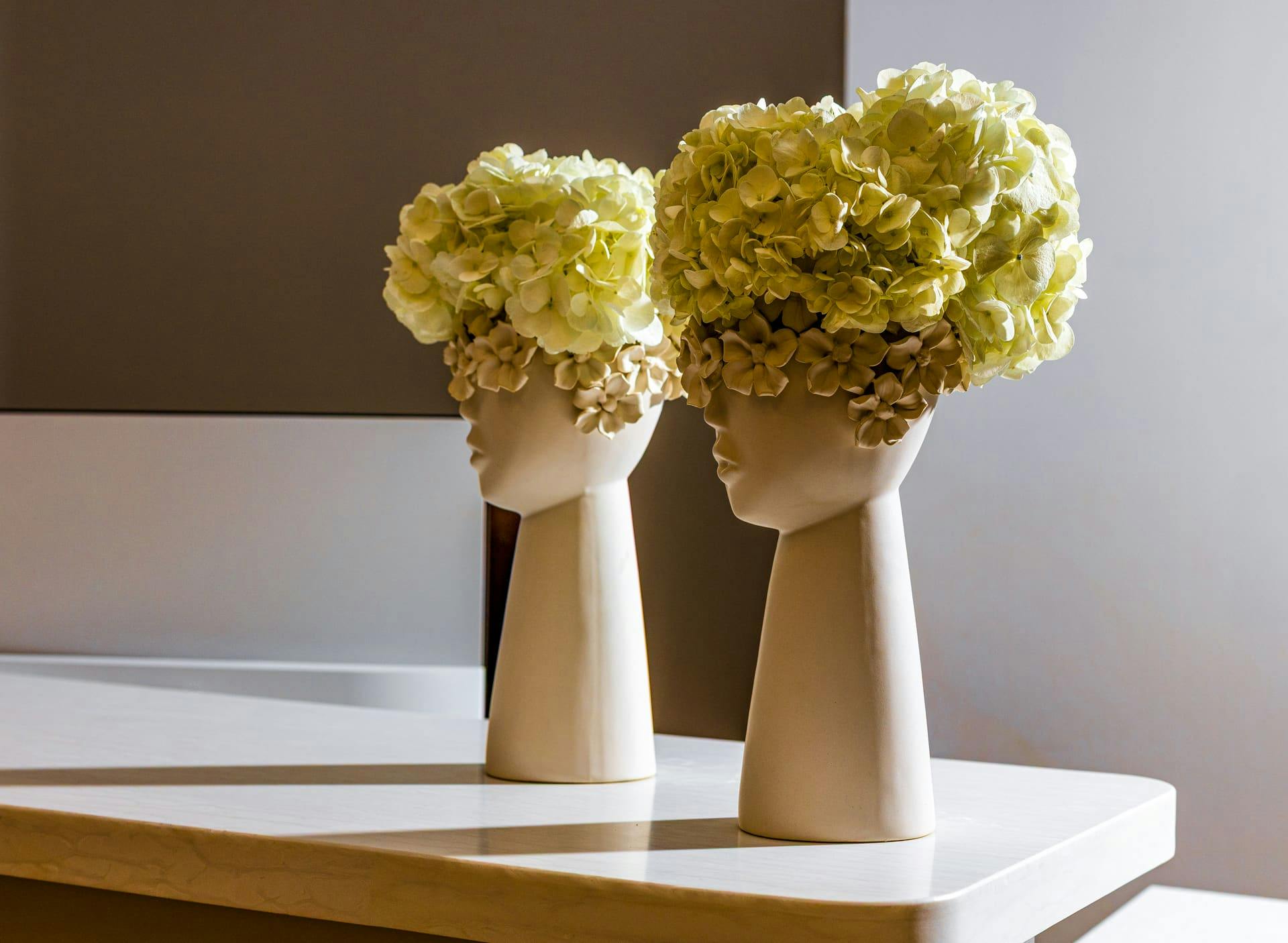 pot with face with flowers as hair