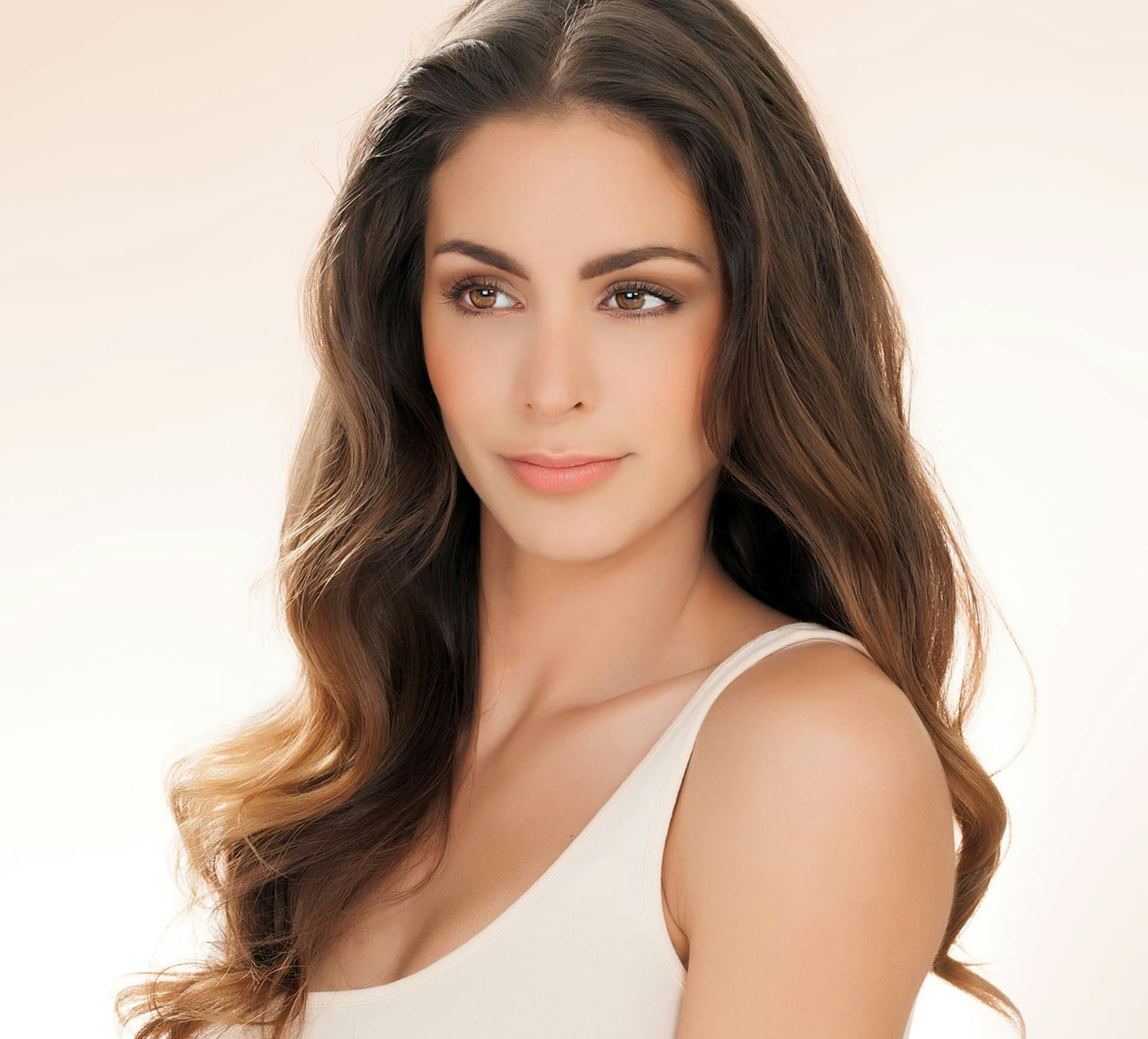 woman with long wavy brunette hair