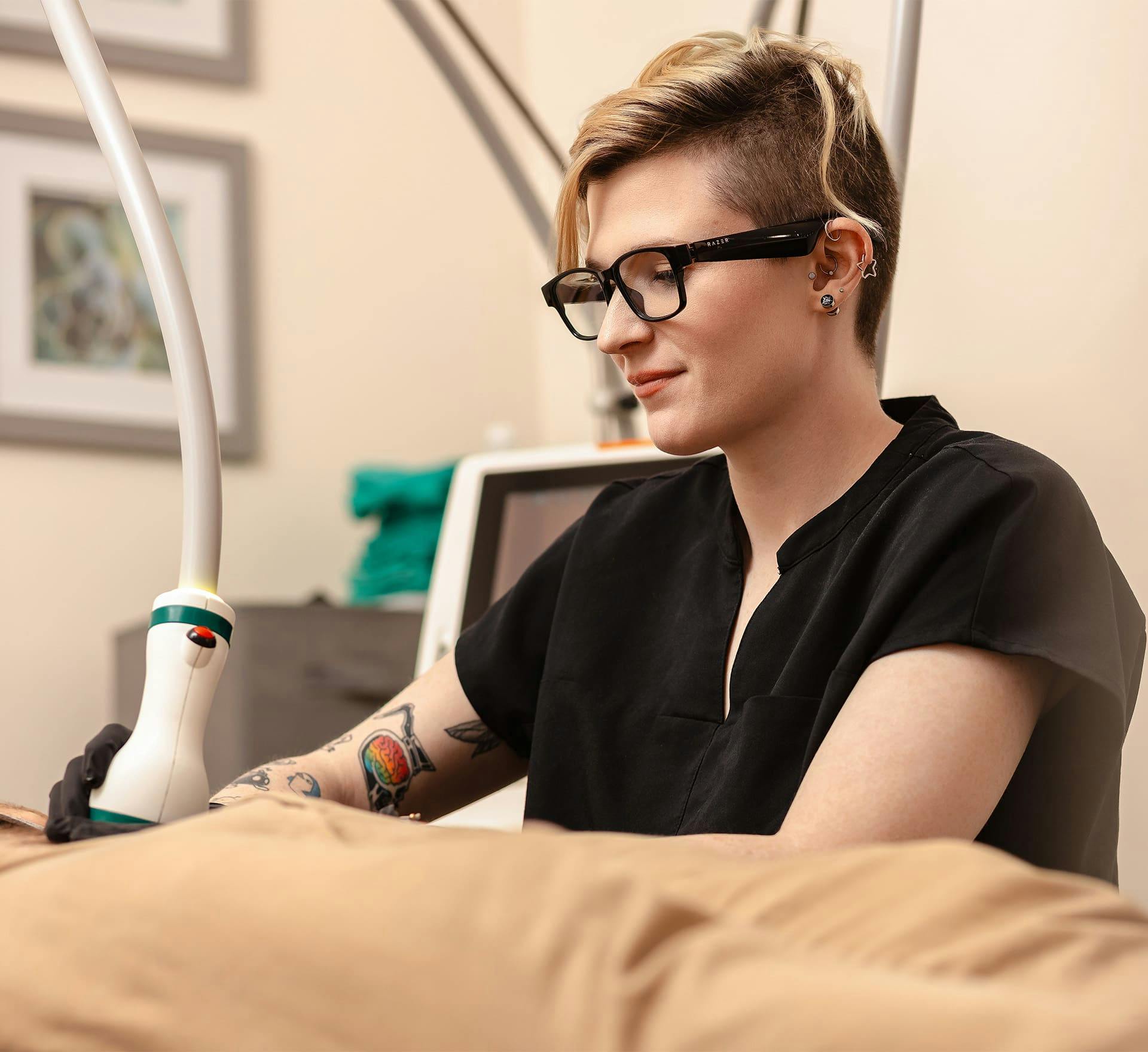 medical assistant working on patient