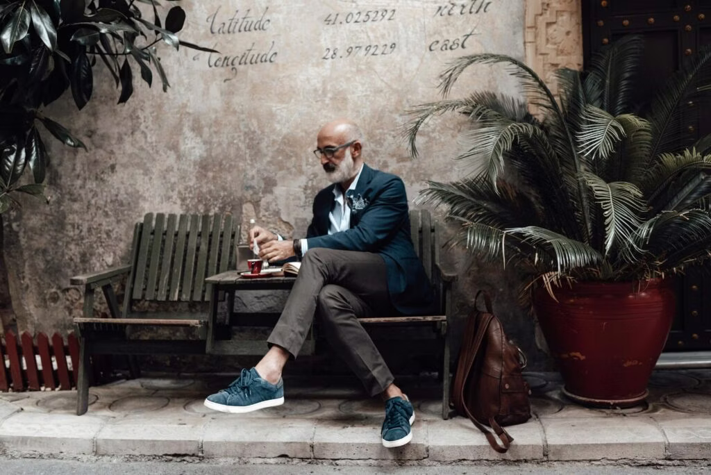 pexels-furkanfdemir-6309766-1024x684.jpg person, sitting, shoe, adult, male, man, chair, plant, handbag, cup