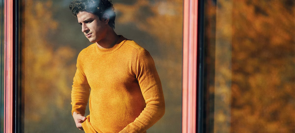 face, head, person, clothing, knitwear, sweater, smoke, long sleeve, sleeve