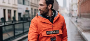 DT-5951_BrandComm_Magazine_2-300x136.jpg clothing, coat, jacket, vest